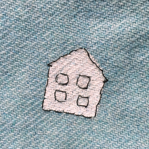 hand embroidered childre's drawings onto wool tweed skirt
