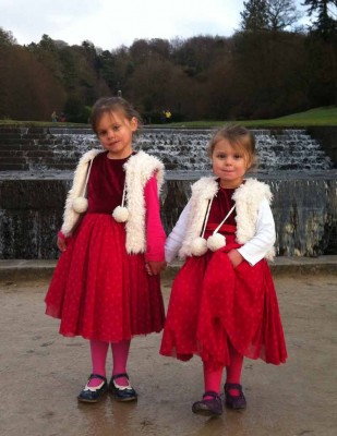 red velvet and tulle party dresses with yeti fur waistcoats