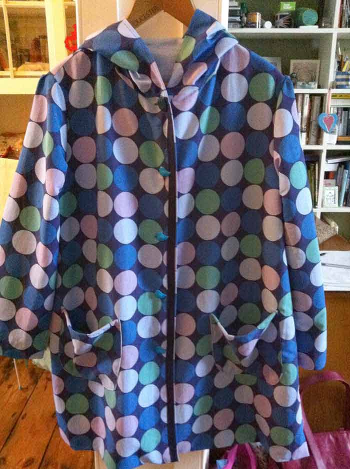 blue spotty proofed poly raincoat