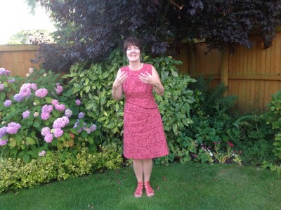 raspberry embroidered linen dress