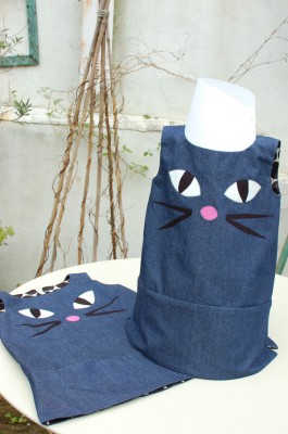 denuim dresses with embroidered pussy cat faces and glow in the dark eyes