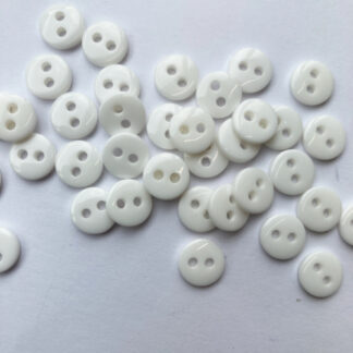 white plastic 2 hole tiny button