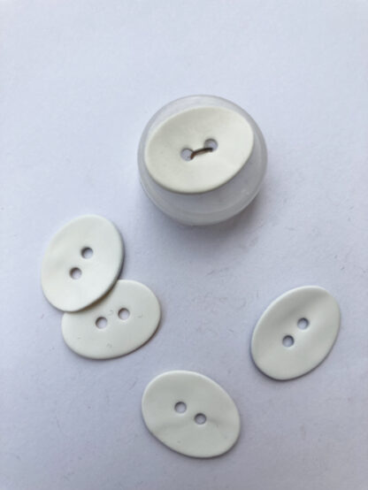 white painted shell oval 2 hole flat button