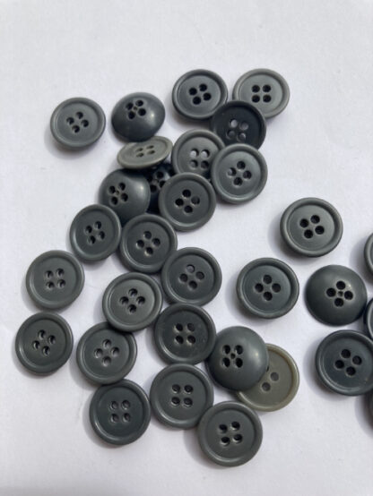 Grey traditional 4 hole plastic rugby shirt button