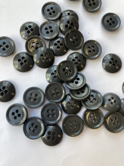 Grey traditional 4 hole plastic rugby shirt button