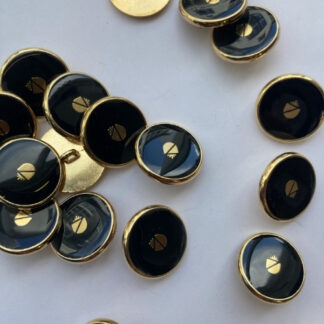 black and gold acorn emblem blazer button