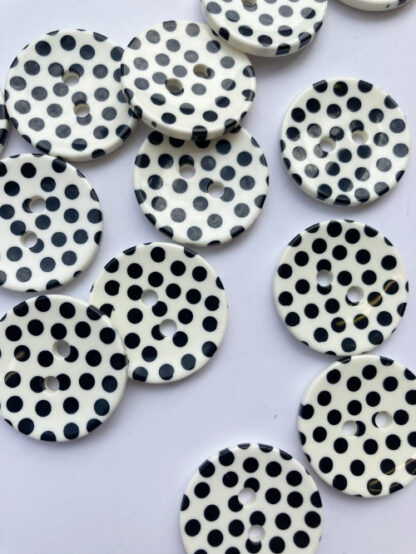 black and white spotty plastic 2 hole button