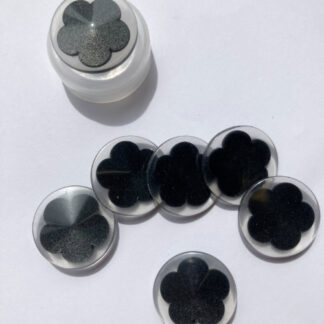 Black and Clear Mary Quant daisy glossy plastic button