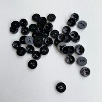 black miniature dolls buttons