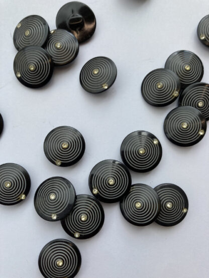 Black circle print with diamanté plastic shank button