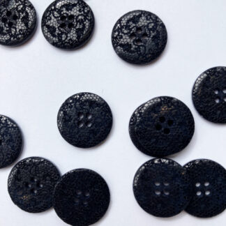 Black lacey embossed matt and gloss plastic 2 hole button