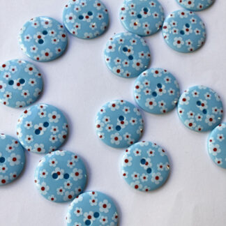 blue and red spotty print spotty print glossy plastic button