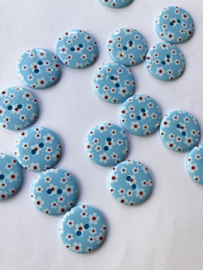 blue and red spotty print spotty print glossy plastic button