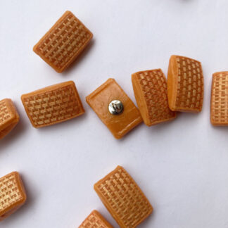 Orange raffia effect vintage plastic shank button