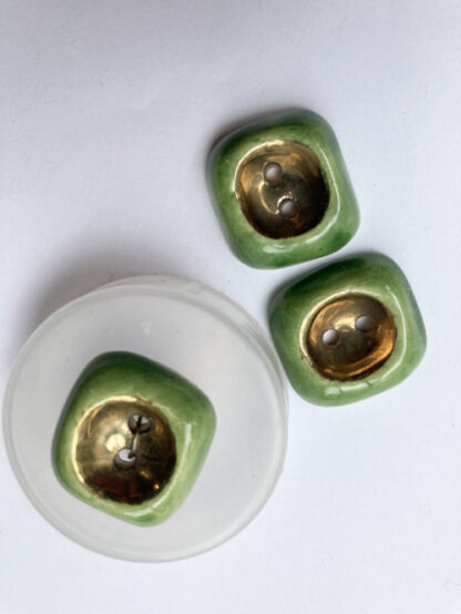 Green and Gold ceramic vintage thumb dent 2 hole button