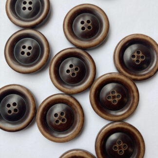 tan and dark brown traditional 4 hole coat button