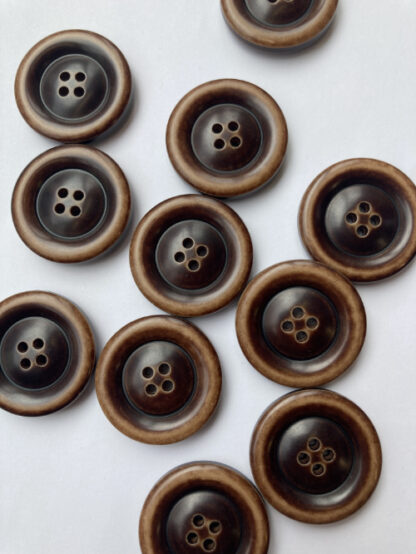 tan and dark brown traditional 4 hole coat button