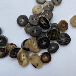 Brown and Beige Camel Horn Button **sizes and shapes can vary, these buttons are slices of natural horn**