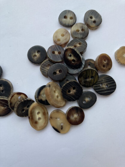 Brown and Beige Camel Horn Button **sizes and shapes can vary, these buttons are slices of natural horn**