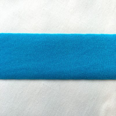 Electric Turquoise Lycra tape used for binding, stabilising and finishing