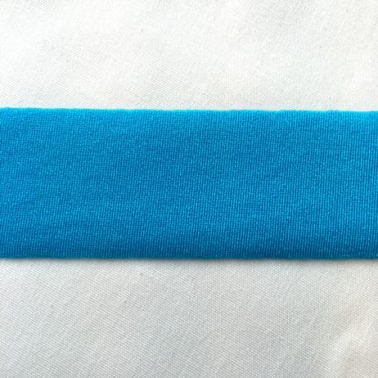 Electric Turquoise Lycra tape used for binding, stabilising and finishing