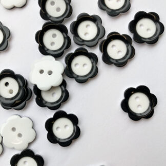 Black and White Mary Quant flower glossy plastic 2 hole button