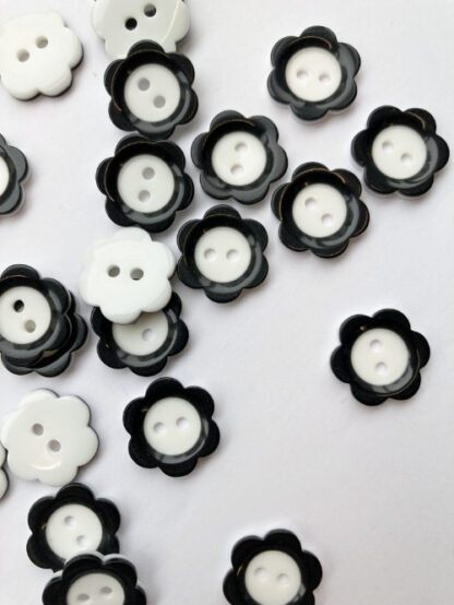 Black and White Mary Quant flower glossy plastic 2 hole button