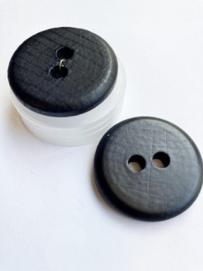 black stained wood two hole button