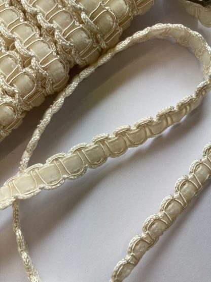 Cream gimp Braid with velvet ribbon Braid. 50% Polyester 40% Viscose 10% Cotton