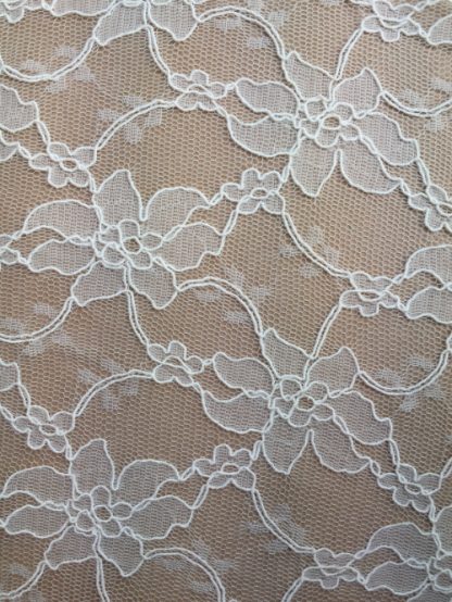 ivory scallop border corded lace