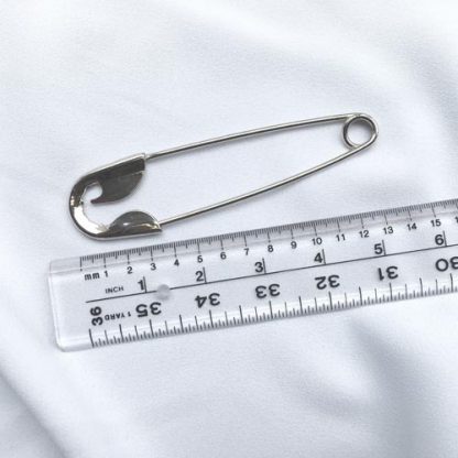 giant silver coloured safety pin