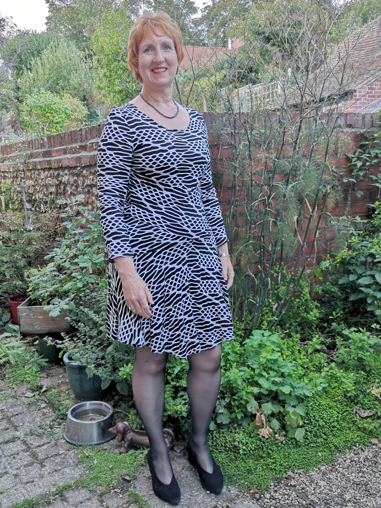 black and white monotone cloqué pintucked jersey fit and flare dress