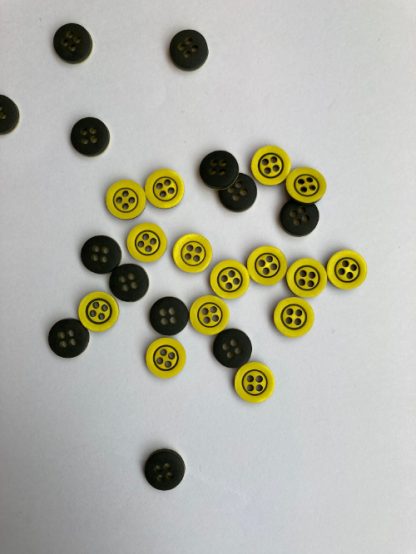 Yellow 10mm 4 hole shirt button with engraved black rim