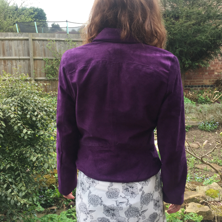 back view of purple suede jacket