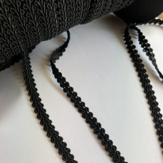 Black gimp figure of eight Braid, 68% Viscose 35% Cotton