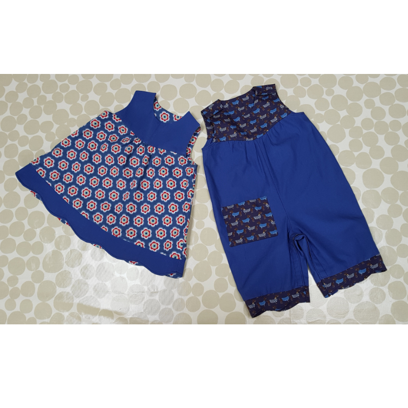 blue cotton romper suit and matching floral dress