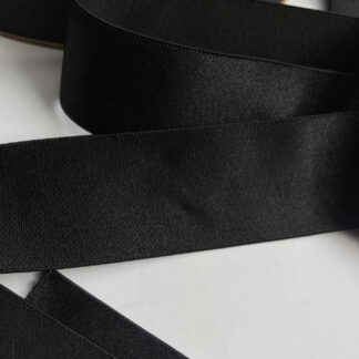 Black satin finish decorative elastic for waistbands and straps