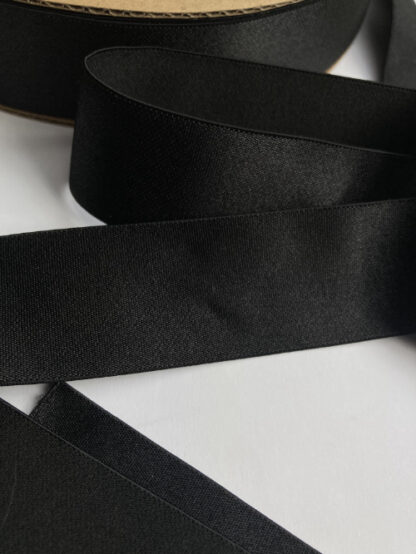 Black satin finish decorative elastic for waistbands and straps