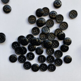 Black four hole corozo nut wooden shirt button