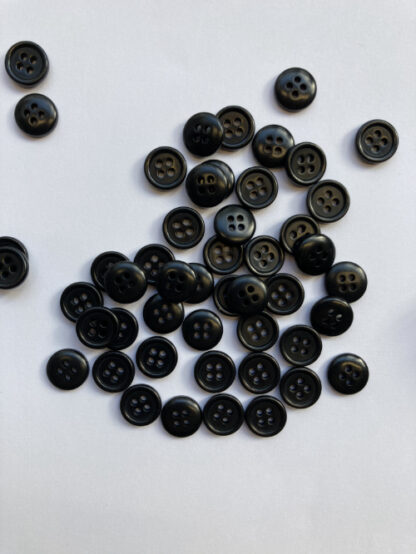 Black four hole corozo nut wooden shirt button