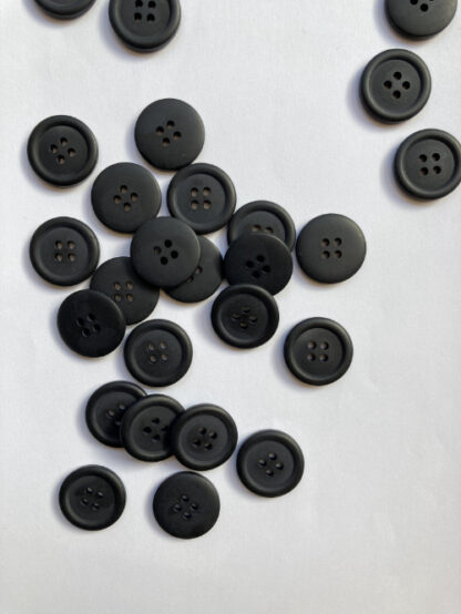 Black four hole matt plastic shirt button