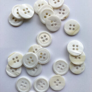 white 4 hole shell button with rim