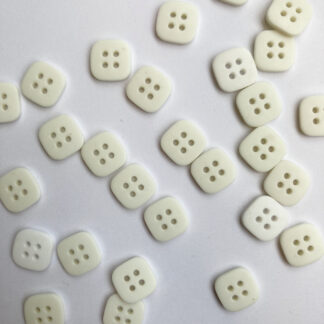 white square plastic shirt buttons