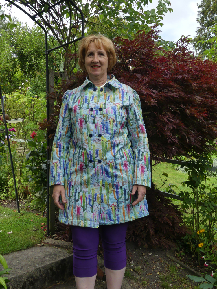 cactus print laminated cotton double breasted raincoat