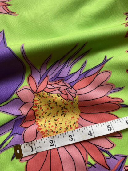 bright lime and multicolour big floral print quilting cotton with ruler for scale