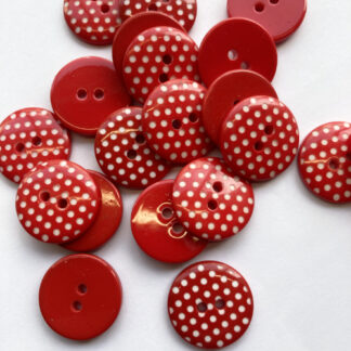 red and white polka dot plastic 2 hole flat button