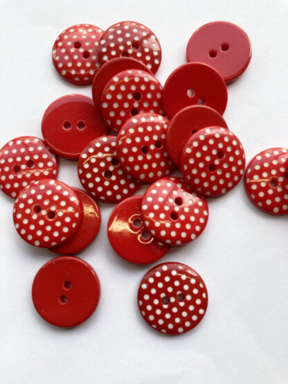 red and white polka dot plastic 2 hole flat button