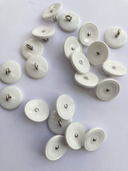 White vintage plastic shank button