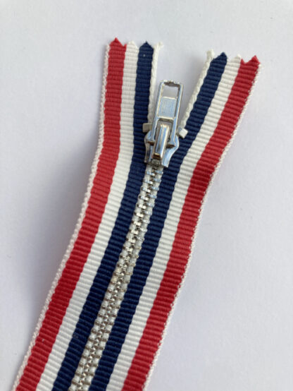 Navy Blue, White and Red decorative grosgrain tape with metal teeth closed end Zip