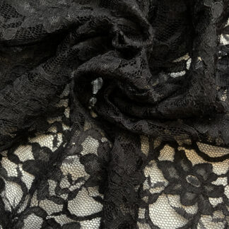 Black 55% Polyamide 45% Cotton corded floral Lace. Double scalloped selvedges